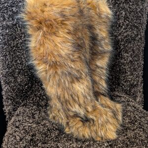 faux fur boots, often referred to as "yeti boots" or "fluffy boots".